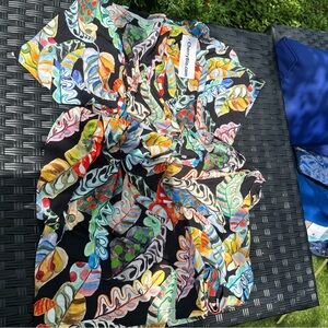 Summer dress, new no tags,made in Europe, stretch with side pockets, loose fit